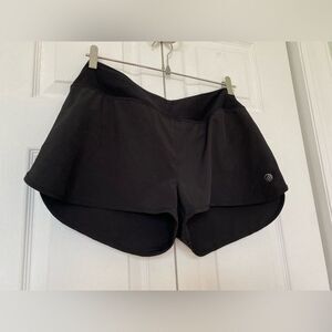 MPG Black Shorts with Zipper Pocket in the back and Turquoise Details